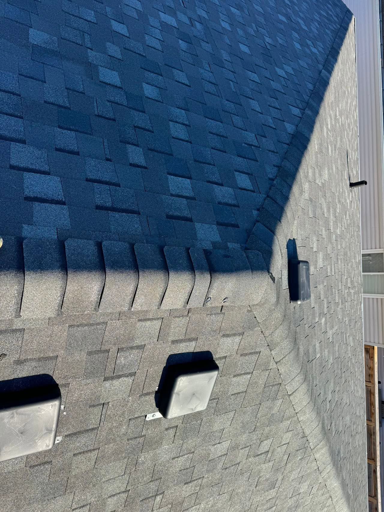 Close-up of new shingle ridge and hip detail